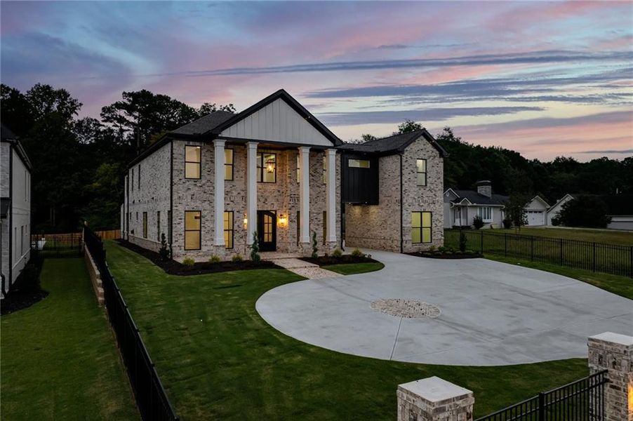 Front exterior of a new home in , Buford, GA, highlighting curb appeal (Image 25). Front exterior of a new home in , Buford, GA, highlighting curb appeal (Image 25).