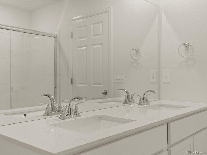 Furnished interior view inside a new home in Skyview at High Point, Aurora (Image 8).