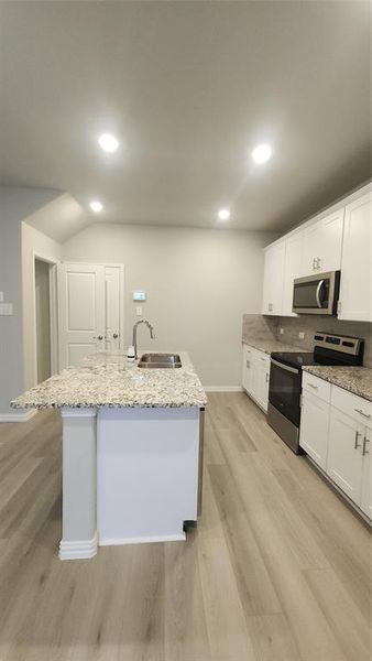 Furnished interior view inside a new home in Bryant Farms, Melissa (Image 5).
