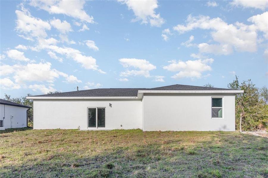 Exterior details and patio area of a home in , Port Charlotte (Image 3).