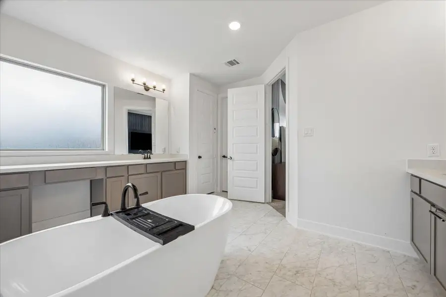 Furnished interior view inside a new home in Del Bello Lakes – 60', Manvel (Image 15).