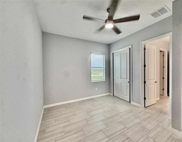 Spacious, unfurnished interior of a new home in Calusa Country Club, Lakewood Ranch (Image 29). Spacious, unfurnished interior of a new home in Calusa Country Club, Lakewood Ranch (Image 29).