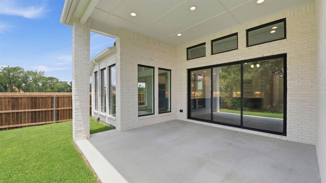 Exterior details and patio area of a home in The Parks at Wilson Creek, Celina (Image 3).
