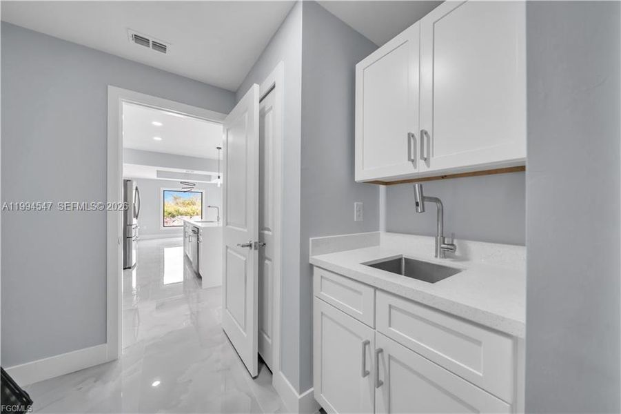 Furnished interior view inside a new home in , Lehigh Acres (Image 29).