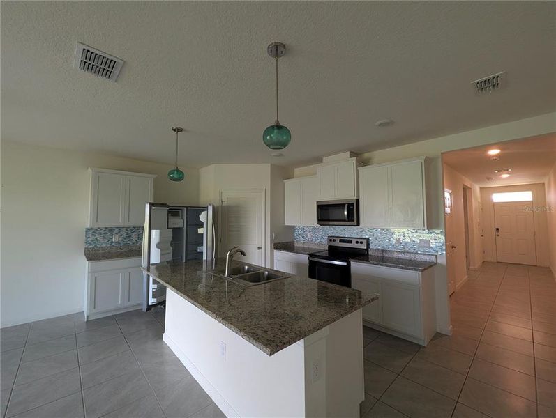 Furnished interior view inside a new home in Cypress Bay West, Palm Bay (Image 6). Furnished interior view inside a new home in Cypress Bay West, Palm Bay (Image 6).