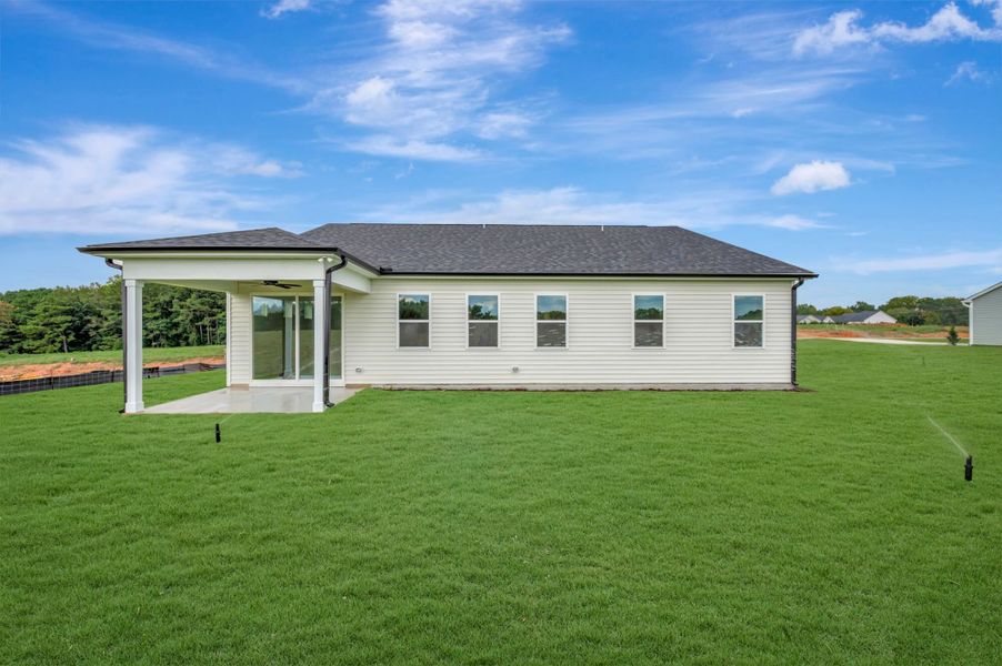 Exterior details and patio area of a home in McAlister Creek, Clayton (Image 3).