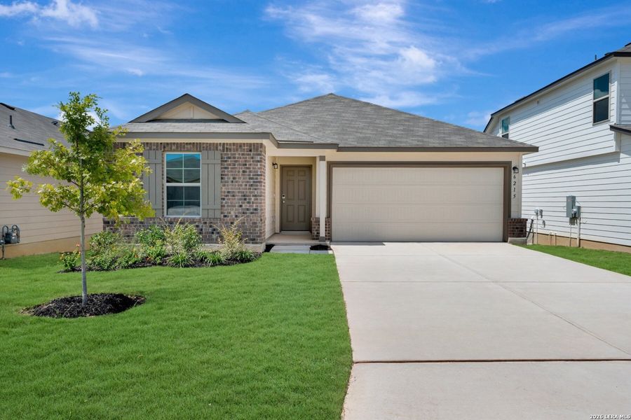 Front exterior of a new home in Lone Oak, San Antonio, TX, highlighting curb appeal (Image 2). Front exterior of a new home in Lone Oak, San Antonio, TX, highlighting curb appeal (Image 2).