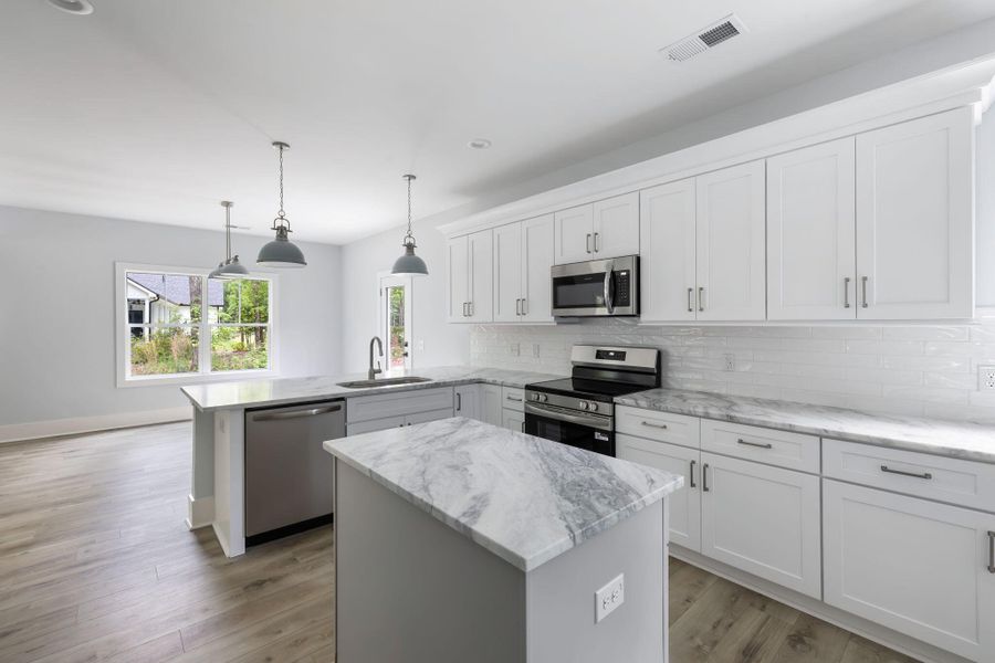 Furnished interior view inside a new home in , Johns Island (Image 7).