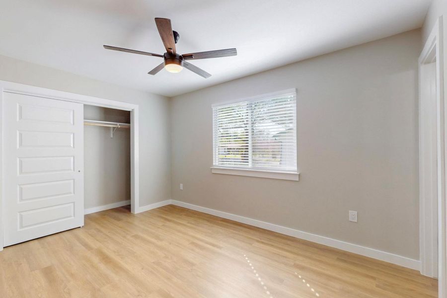 Nice new closet doors, ceiling fans, blinds and more.