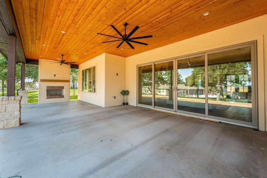 View of patio featuring ceiling fan