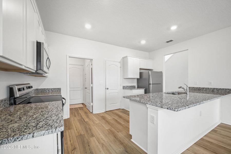 Furnished interior view inside a new home in Westport Landing, Jacksonville (Image 8).
