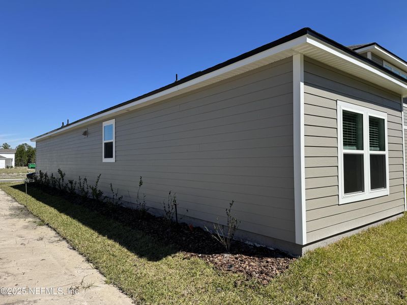 Front exterior of a new home in , Green Cove Springs, FL, highlighting curb appeal (Image 23).