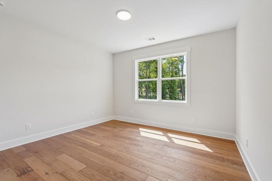 Spacious, unfurnished interior of a new home in Arden on Lanier, Cumming (Image 27).