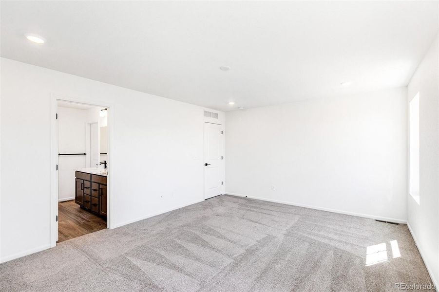 Spacious, unfurnished interior of a new home in Terrain Oak Valley, Castle Rock (Image 21).