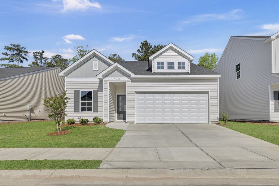 Front exterior of a new home in River Tide Farms, Bolivia, NC, highlighting curb appeal (Image 1). Front exterior of a new home in River Tide Farms, Bolivia, NC, highlighting curb appeal (Image 1).