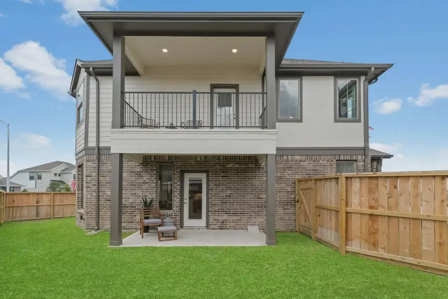 Representative exterior details of a home built from the Capeside by Chesmar Homes in Meridiana Courtyard Collection, Manvel (Image 3).