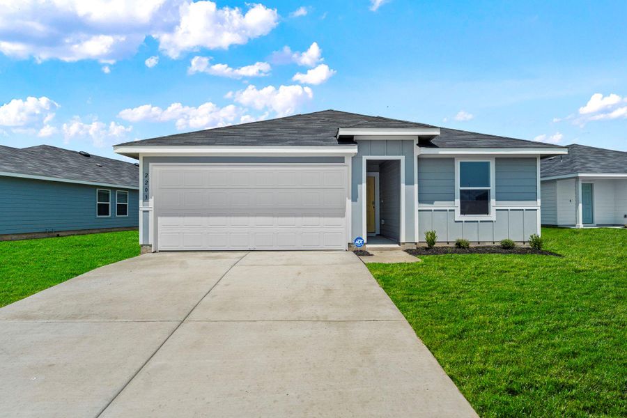 Front exterior of a new home in Ladera, Luling, TX, highlighting curb appeal (Image 1). Front exterior of a new home in Ladera, Luling, TX, highlighting curb appeal (Image 1).