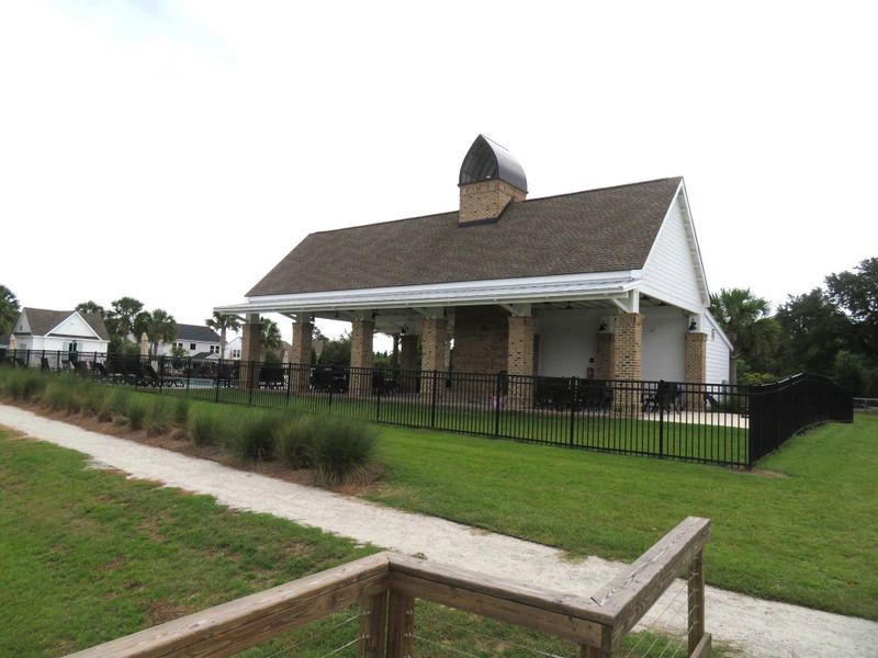 Front exterior of a new home in Saint John's Lake: Coastal Collection, Johns Island, SC, highlighting curb appeal (Image 25).