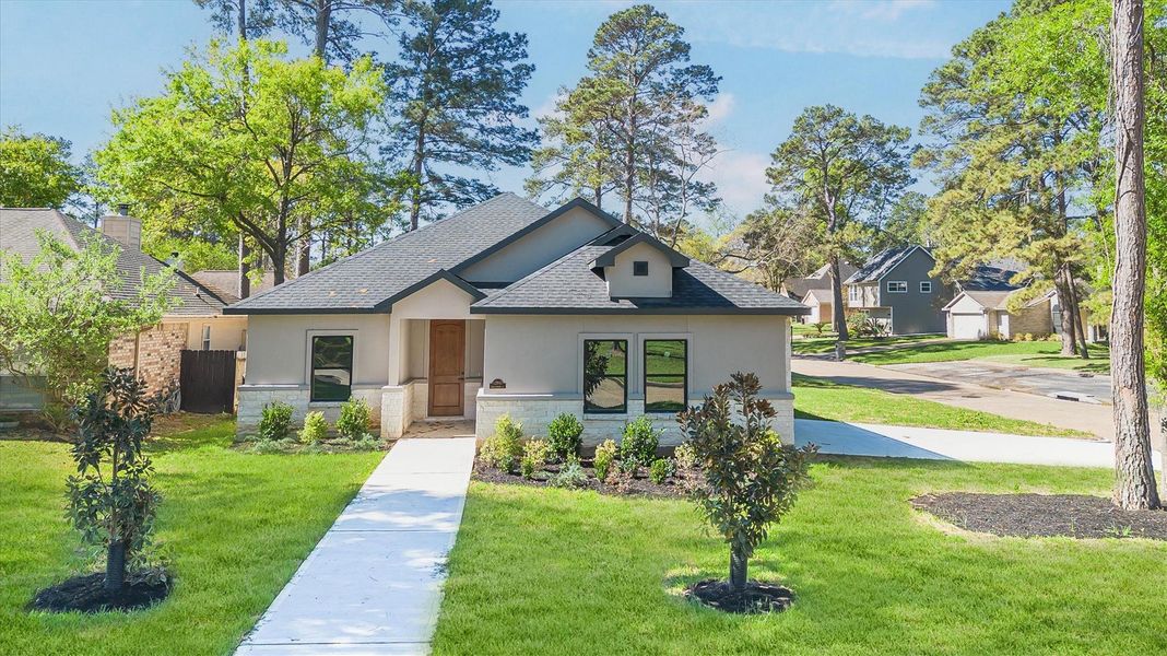 Front exterior of a new home in , Montgomery, TX, highlighting curb appeal (Image 25).