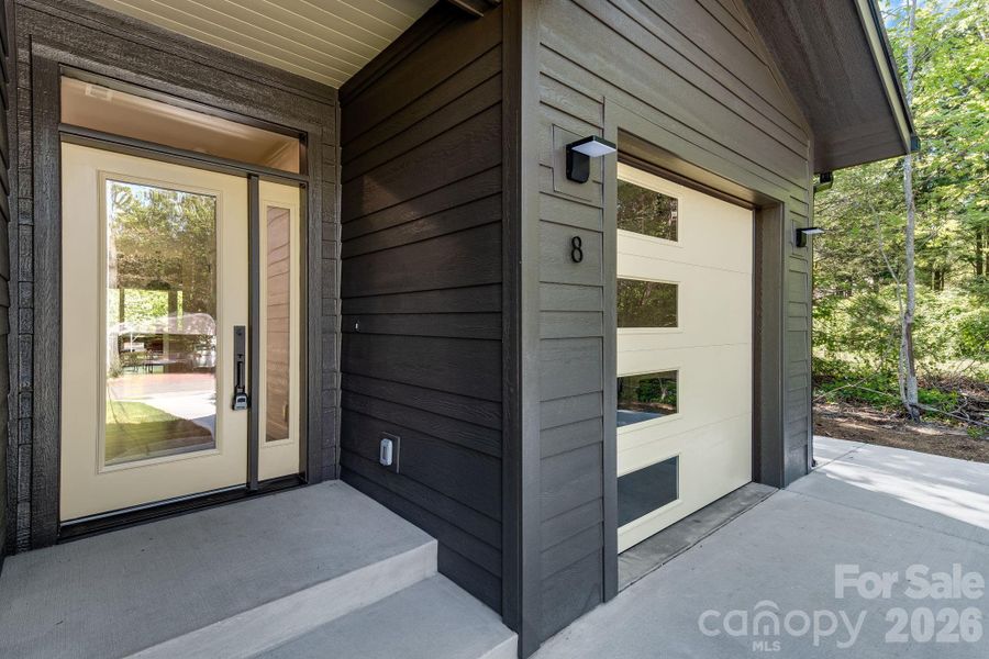Exterior details and patio area of a home in , Black Mountain (Image 3).