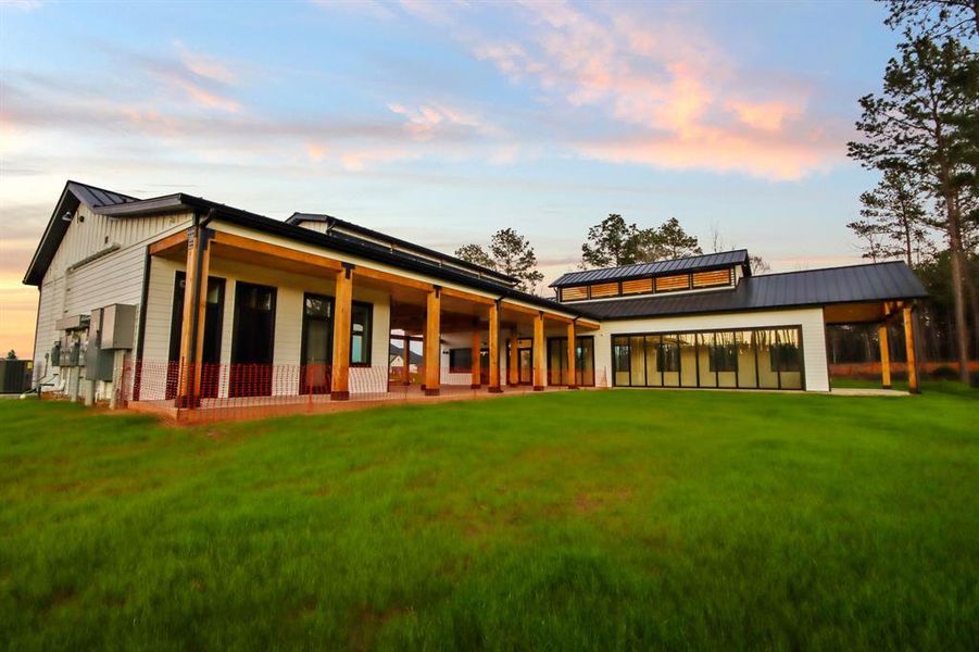 Front exterior of a new home in Silverthorne, Conroe, TX, highlighting curb appeal (Image 13).