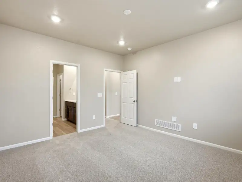 Spacious, unfurnished interior of a new home in Paint Brush Hills, Peyton (Image 13). Spacious, unfurnished interior of a new home in Paint Brush Hills, Peyton (Image 13).
