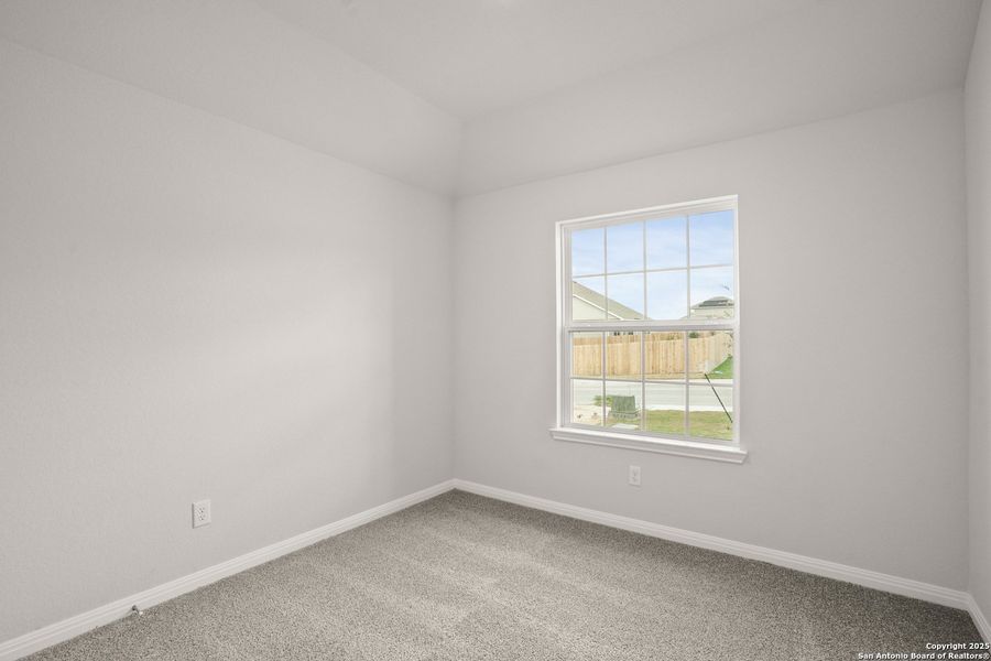 Spacious, unfurnished interior of a new home in Hunters Ranch, San Antonio (Image 13).