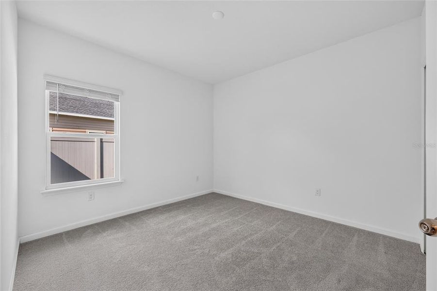 Spacious, unfurnished interior of a new home in Heath Preserve, Ocala (Image 49).
