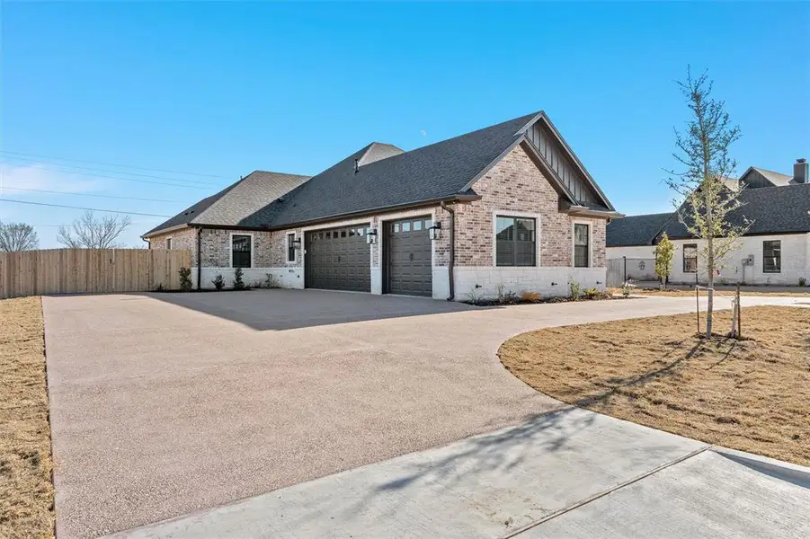 Front exterior of a new home in , Robinson, TX, highlighting curb appeal (Image 22).