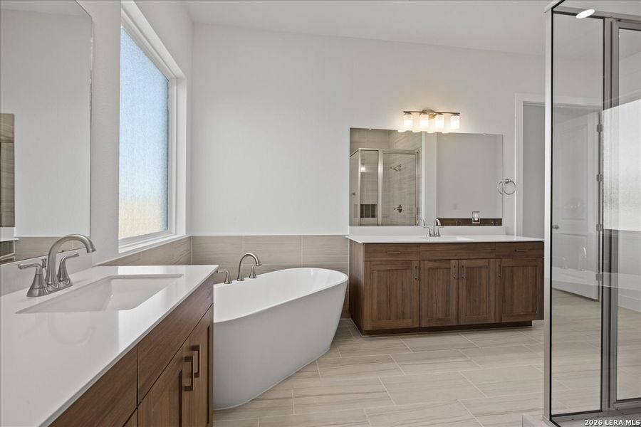 Furnished interior view inside a new home in Village at Three Oaks, Seguin (Image 11).