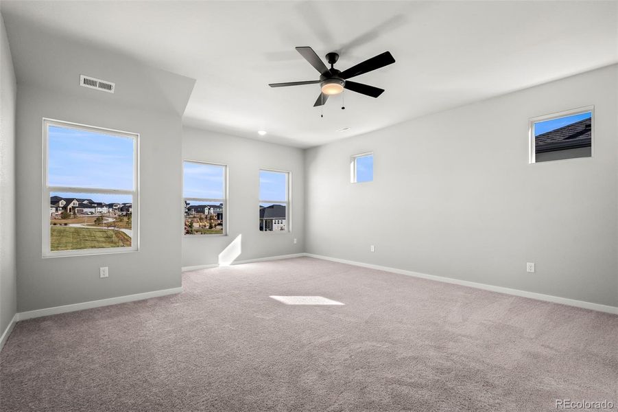 Spacious, unfurnished interior of a new home in Revel Crossing at Wolf Ranch – The Outlook Collection, Colorado Springs (Image 28).
