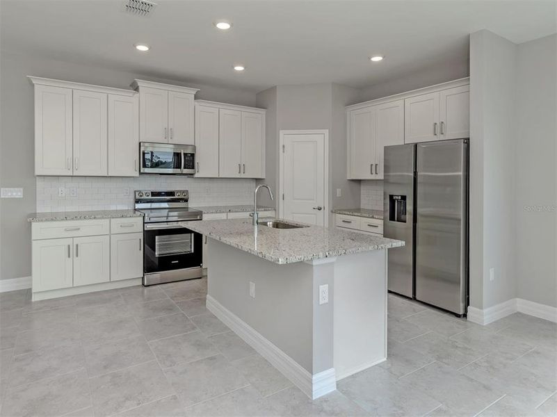 Furnished interior view inside a new home in , North Port (Image 8).