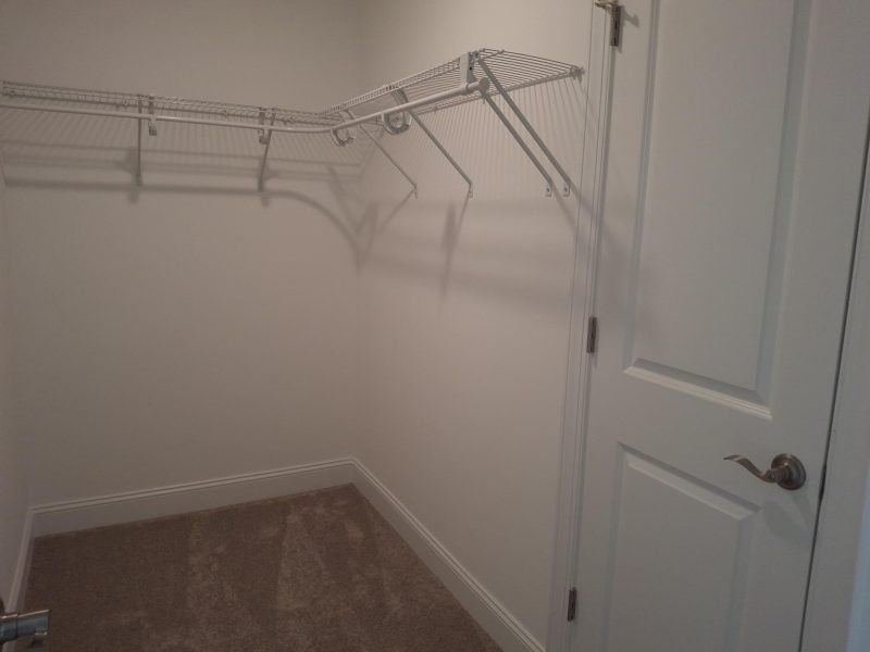Spacious, unfurnished interior of a new home in Weybridge, Burlington (Image 66).