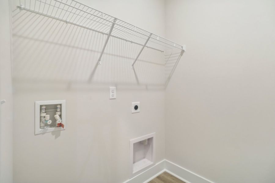 Representative furnished interior of a home built from the Baymore II by Great Southern Homes in Edwards Ridge, Central (Image 6).