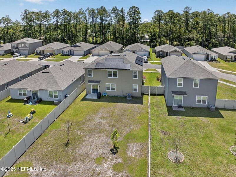 Front exterior of a new home in River Glen Express, Yulee, FL, highlighting curb appeal (Image 23).