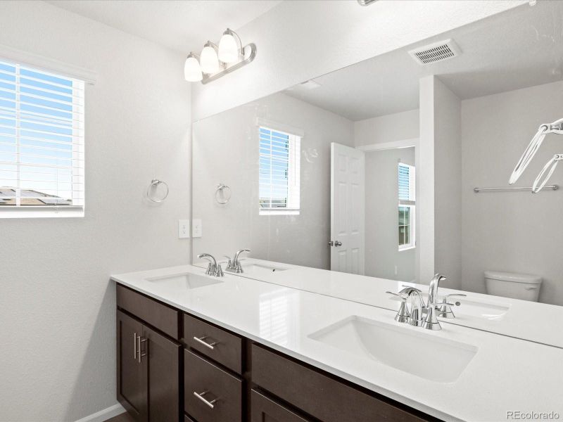 Furnished interior view inside a new home in Buffalo Highlands: The Canyon Collection, Commerce City (Image 27).