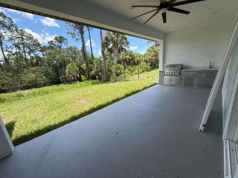 Exterior details and patio area of a home in , North Port (Image 22).