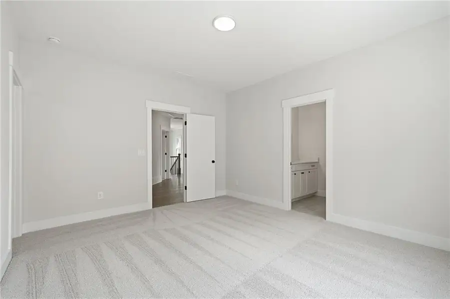 Spacious, unfurnished interior of a new home in Malone's Pond, Ball Ground (Image 29).