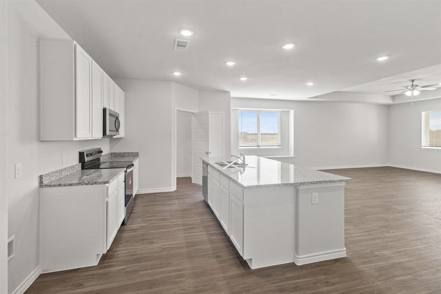 Furnished interior view inside a new home in Retreat at Fossil Creek, Fort Worth (Image 5). Furnished interior view inside a new home in Retreat at Fossil Creek, Fort Worth (Image 5).