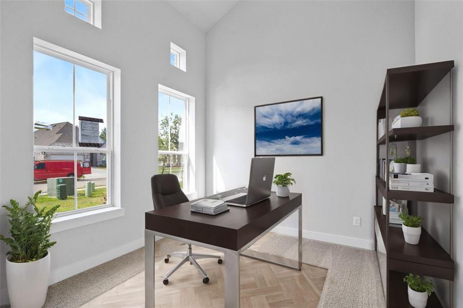 Quietly nestled in front of the home is the handsome home office. Featuring plush carpet flooring, custom paint and a large windows.