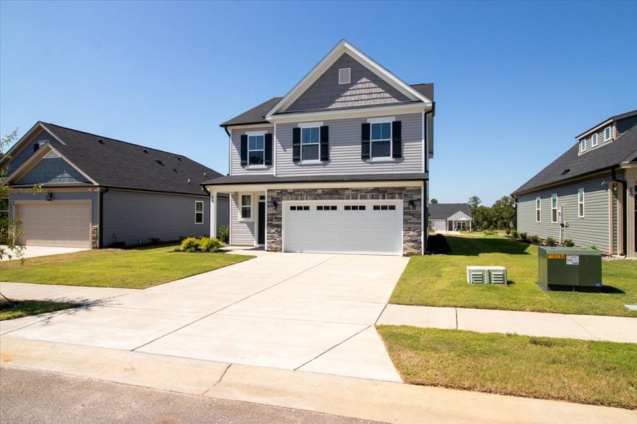 Front exterior of a new home in Windsor, North Augusta, SC, highlighting curb appeal (Image 16).