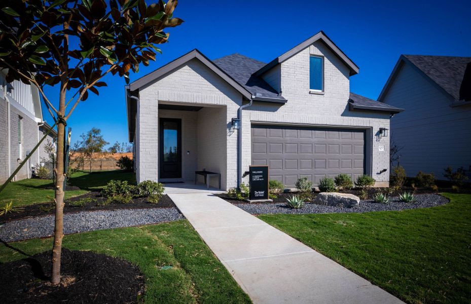 Representative exterior photo of a completed home built from the Hallmark by Del Webb in Del Webb Austin at Lost Pines, Bastrop, TX (Image 31).