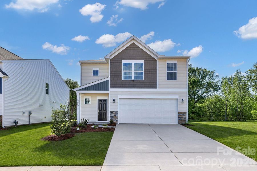 Front exterior of a new home in Cleveland Hill, Shelby, NC, highlighting curb appeal (Image 1). Front exterior of a new home in Cleveland Hill, Shelby, NC, highlighting curb appeal (Image 1).