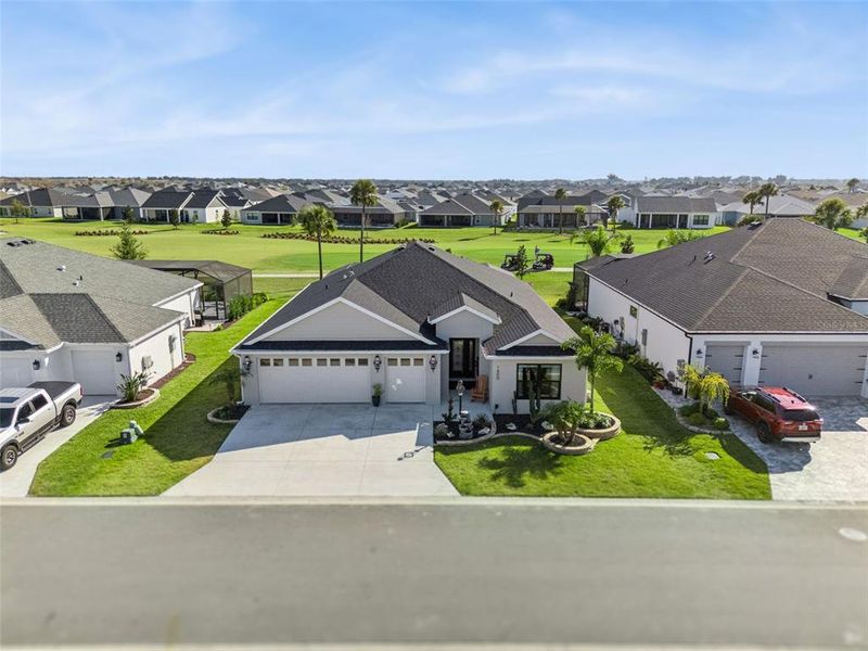 Front exterior of a new home in , The Villages, FL, highlighting curb appeal (Image 24).