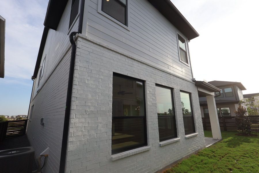 Exterior details and patio area of a home in Easthaven at Bridgeland Central - Vision Collection, Cypress (Image 3). Exterior details and patio area of a home in Easthaven at Bridgeland Central - Vision Collection, Cypress (Image 3).