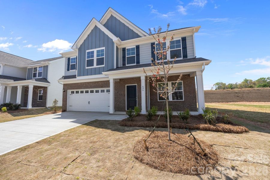 Front exterior of a new home in McFarland Estates, York, SC, highlighting curb appeal (Image 15). Front exterior of a new home in McFarland Estates, York, SC, highlighting curb appeal (Image 15).