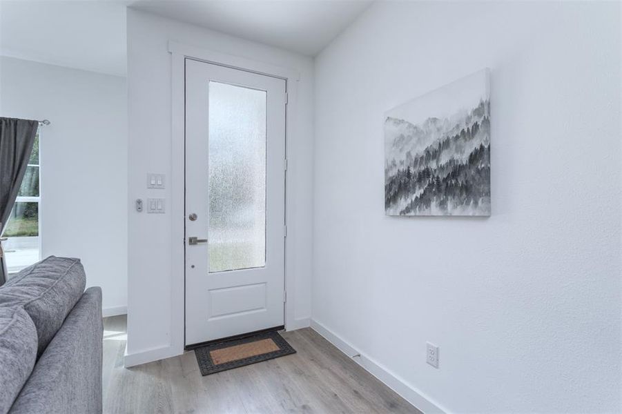 Entryway featuring light hardwood / wood-style floors