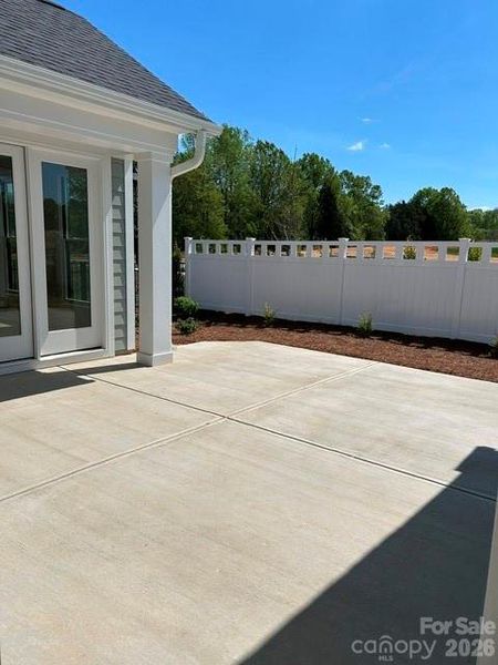 Exterior details and patio area of a home in The Courtyards at Hodges Farm, Charlotte (Image 3).