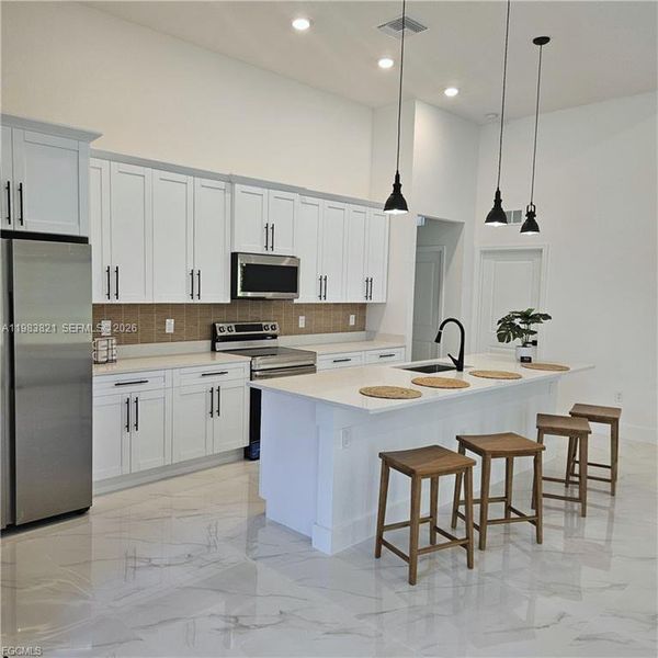 Furnished interior view inside a new home in , Lehigh Acres (Image 5). Furnished interior view inside a new home in , Lehigh Acres (Image 5).