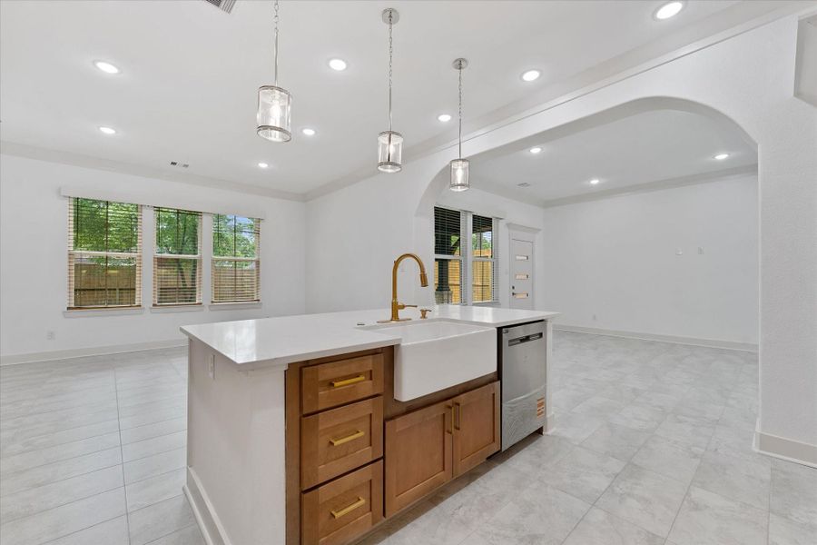 You'll love the spacious kitchen island with farmhouse sink & dishwasher. You'll love the spacious kitchen island with farmhouse sink & dishwasher.